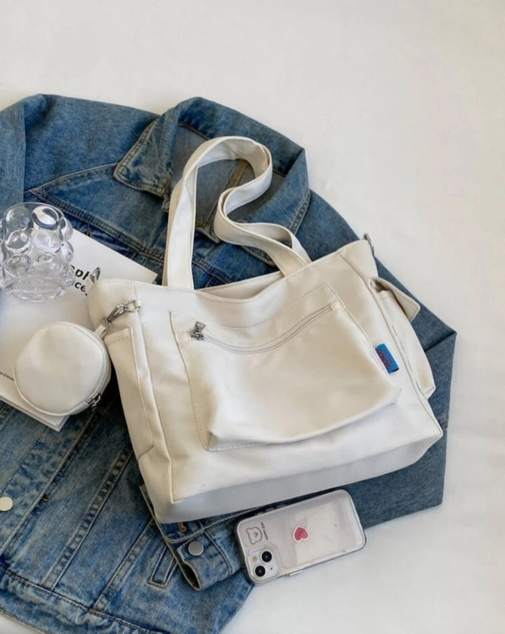 Bolso con múltiples bolsillos y monedero