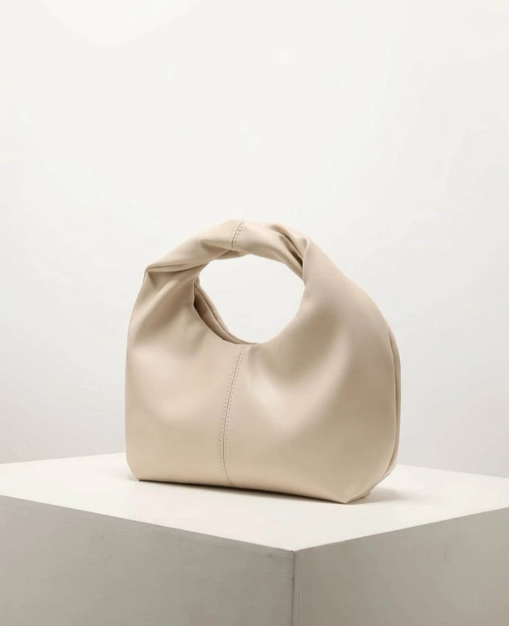 Bolso de mano minimalista beige
