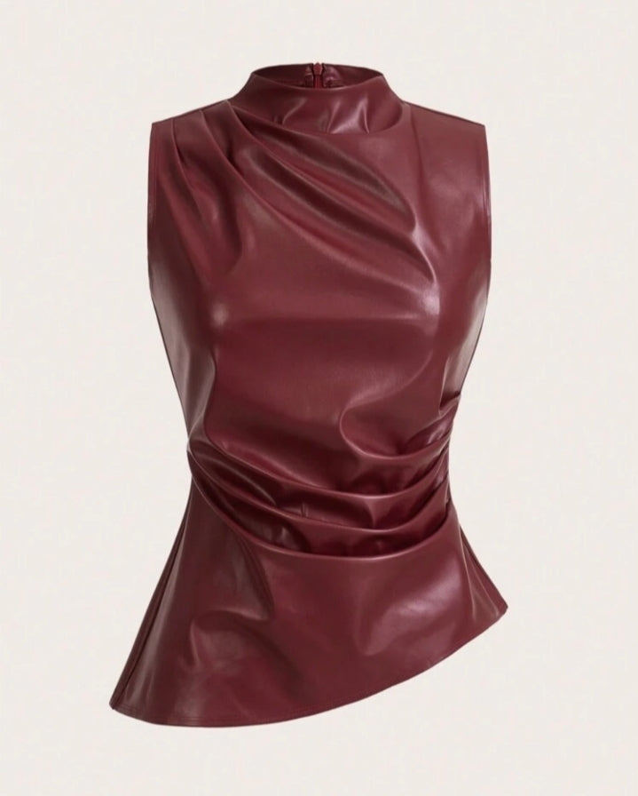 Blusa en cuerina cuello alto