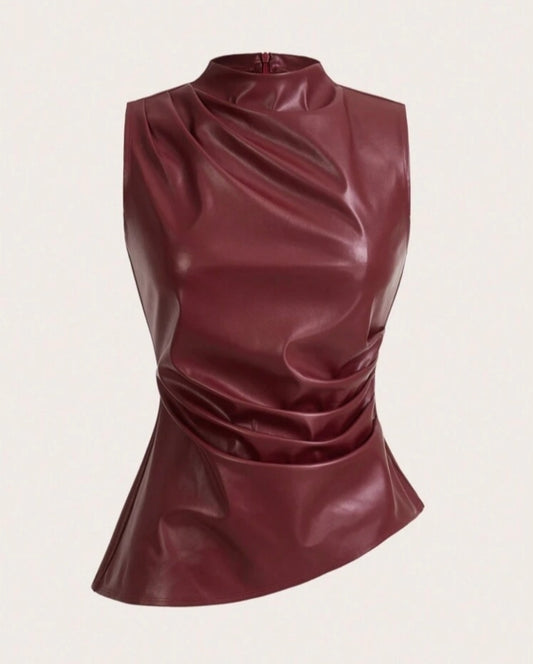 Blusa en cuerina cuello alto
