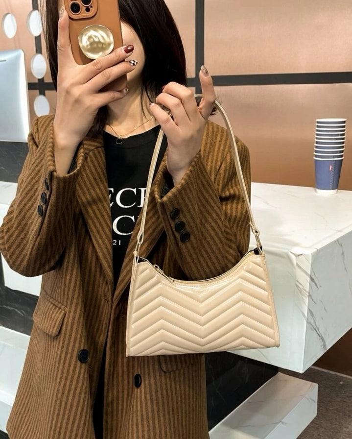 Bolso baguette coucheron