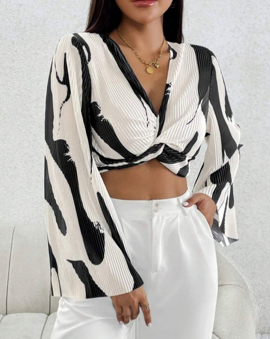 Blusa estampada, tela plisada