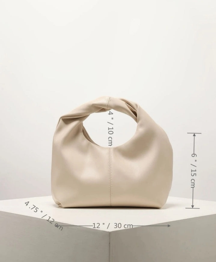 Bolso de mano minimalista beige
