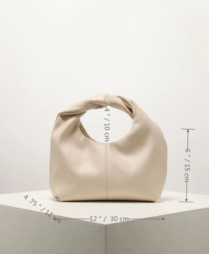 Bolso de mano minimalista beige