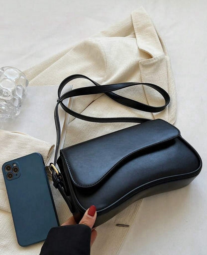 Bolso old money negro