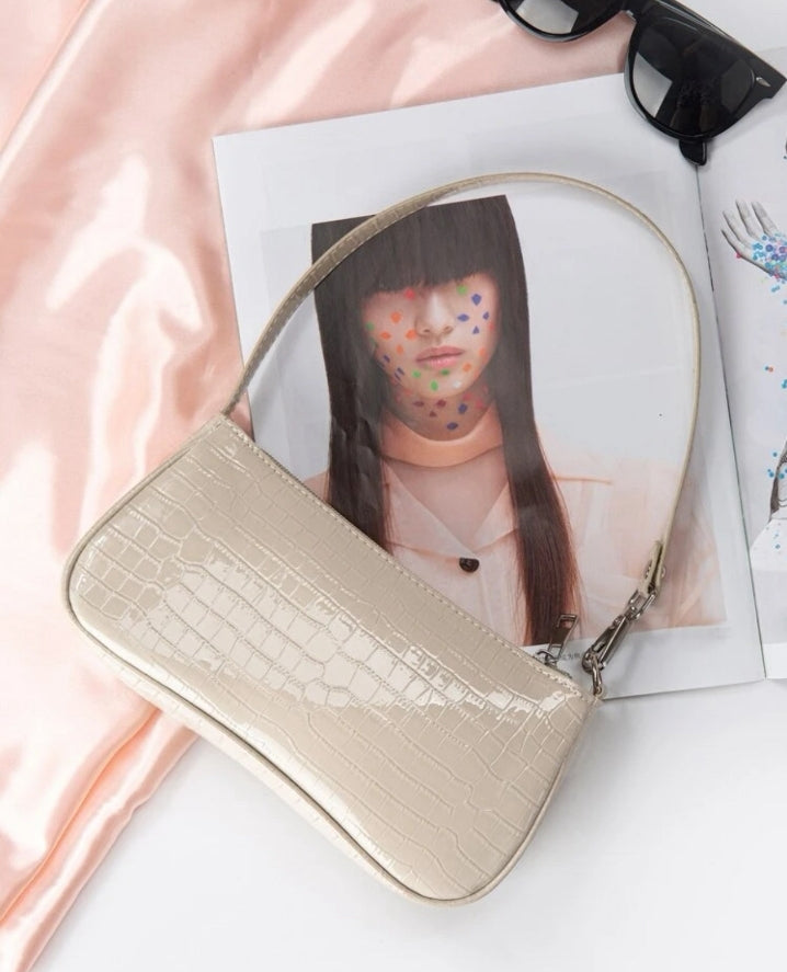 Bolso baguette beige