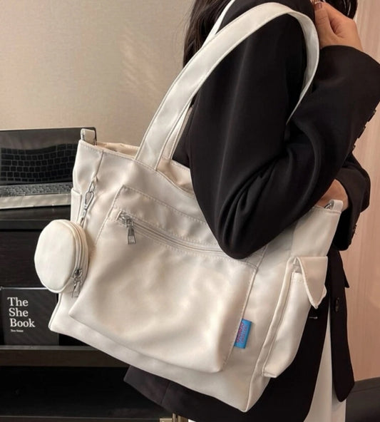 Bolso con múltiples bolsillos y monedero