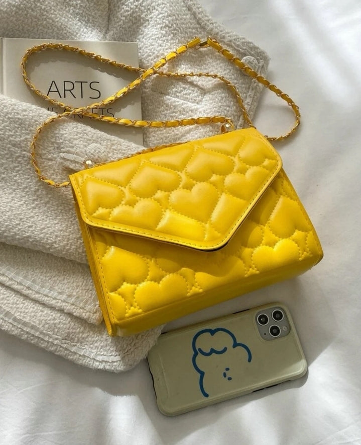 Bolso cuadrado con relieve
