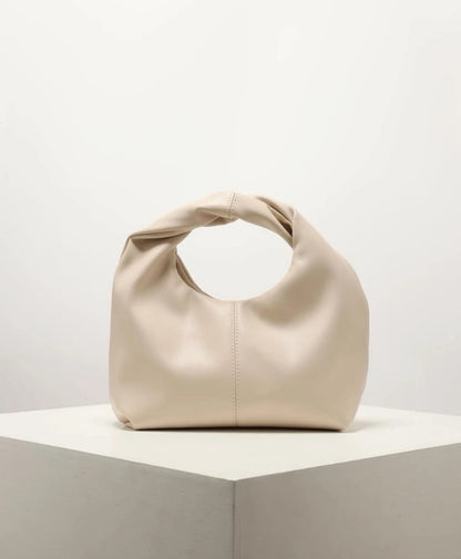 Bolso de mano minimalista beige